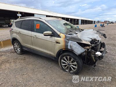 Czwarte zdjęcie samochodu z boku: 2017 FORD ESCAPE TITANIUM VIN:1FMCU9J99HUD59463 - miniatura