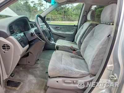 Zdjęcie 7 z 14 samochodu: 2004 HONDA ODYSSEY EX VIN:5FNRL186X4B024293 - miniatura