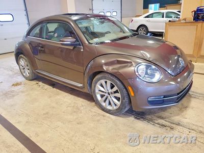 Czwarte zdjęcie samochodu z boku: 2015 VOLKSWAGEN BEETLE TDI VIN:3VWJA7AT5FM640288 - miniatura