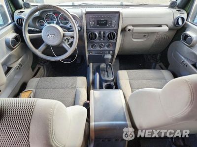 Zdjęcie 8 z 13 samochodu: 2007 JEEP WRANGLER SAHARA VIN:1J4GB59147L143196 - miniatura
