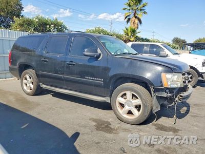 Czwarte zdjęcie samochodu z boku: 2007 CHEVROLET SUBURBAN K1500 VIN:3GNFK16387G298970 - miniatura