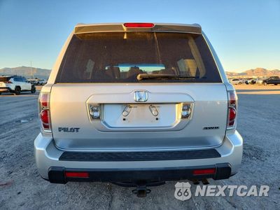 Zdjęcie 6 z 13 samochodu: 2006 HONDA PILOT EX VIN:2HKYF18426H516371 - miniatura