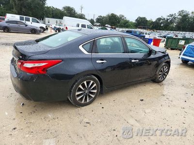 Trzecie zdjęcie samochodu z tyłu: 2016 NISSAN ALTIMA 2.5 SV VIN:1N4AL3AP4GC255922 - miniatura