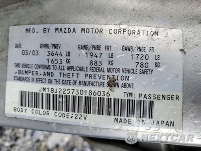 Zdjęcie 12 z 12 samochodu: 2003 MAZDA PROTEGE DX VIN:JM1BJ225730186036 - miniatura