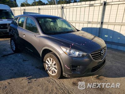 Czwarte zdjęcie samochodu z boku: 2016 MAZDA CX-5 SPORT VIN:JM3KE2BYXG0797707 - miniatura