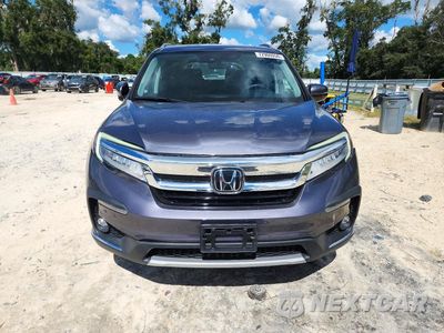 Piąte zdjęcie samochodu w środku: 2022 HONDA PILOT TOURING VIN:5FNYF6H67NB087725 - miniatura