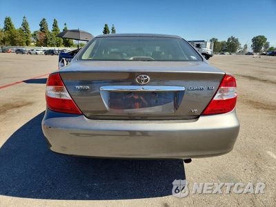 Zdjęcie 6 z 12 samochodu: 2002 TOYOTA CAMRY XLE V6 VIN:JTDBF30K920008515 - miniatura