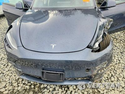 Zdjęcie 11 z 12 samochodu: 2023 TESLA MODEL Y VIN:7SAYGDEE5PA039057 - miniatura