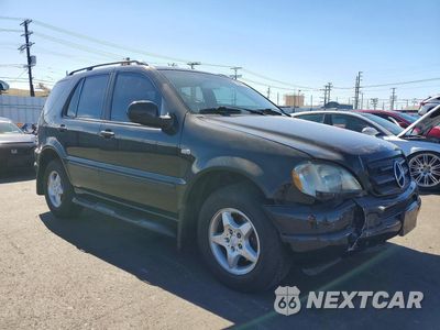 Czwarte zdjęcie samochodu z boku: 2000 MERCEDES-BENZ ML 320 VIN:4JGAB54E8YA147010 - miniatura