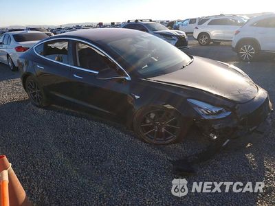 Czwarte zdjęcie samochodu z boku: 2019 TESLA MODEL 3 VIN:5YJ3E1EA5KF316827 - miniatura