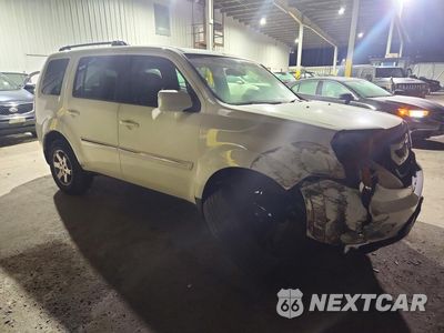 Czwarte zdjęcie samochodu z boku: 2010 HONDA PILOT TOURING VIN:5FNYF4H93AB010262 - miniatura