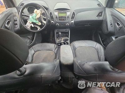Zdjęcie 8 z 13 samochodu: 2011 HYUNDAI TUCSON GLS VIN:KM8JUCAC0BU257900 - miniatura