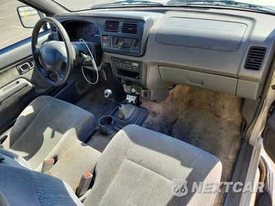 Zdjęcie 8 z 12 samochodu: 1999 NISSAN FRONTIER XE VIN:1N6DD26S4XC324021 - miniatura