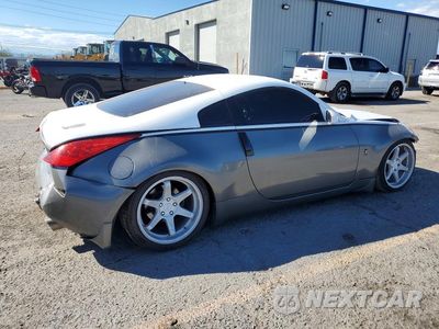 Trzecie zdjęcie samochodu z tyłu: 2004 NISSAN 350Z BASE VIN:JN1AZ34E14T064086 - miniatura