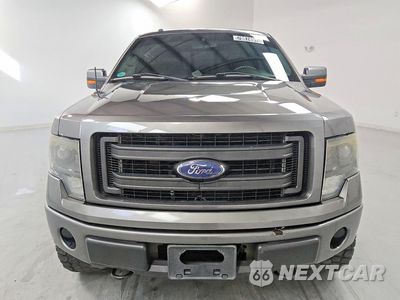 Piąte zdjęcie samochodu w środku: 2014 FORD F150 SUPERCREW VIN:1FTFW1EF3EFA33834 - miniatura