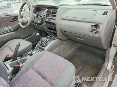 Zdjęcie 8 z 12 samochodu: 1999 CHEVROLET TRACKER VIN:2CNBJ186XX6915553 - miniatura