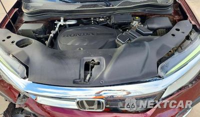 Zdjęcie 12 z 13 samochodu: 2021 HONDA PILOT TOURING VIN:5FNYF5H94MB037271 - miniatura
