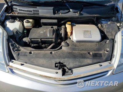 Zdjęcie 12 z 13 samochodu: 2005 TOYOTA PRIUS BASE VIN:JTDKB20U557012919 - miniatura