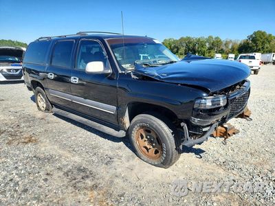 Czwarte zdjęcie samochodu z boku: 2002 CHEVROLET SUBURBAN C1500 VIN:3GNEC16Z82G214717 - miniatura