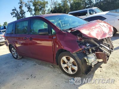 Czwarte zdjęcie samochodu z boku: 2014 TOYOTA SIENNA L 7-PASSENGER VIN:5TDZK3DC7ES525214 - miniatura