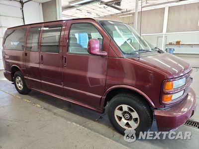 Czwarte zdjęcie samochodu z boku: 2002 CHEVROLET EXPRESS G1500 VIN:1GNFG65RX21132736 - miniatura