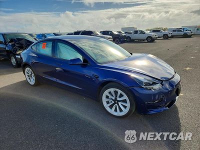 Czwarte zdjęcie samochodu z boku: 2023 TESLA MODEL 3 VIN:5YJ3E1EB3PF669261 - miniatura