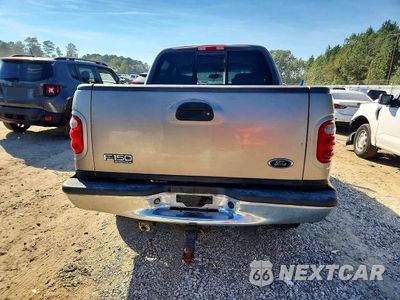 Zdjęcie 6 z 12 samochodu: 2002 FORD F150 SUPERCREW VIN:1FTRW07L52KA94762 - miniatura