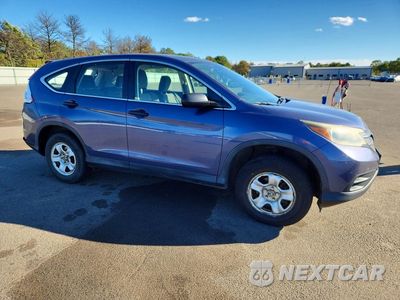Czwarte zdjęcie samochodu z boku: 2014 HONDA CR-V LX VIN:2HKRM4H39EH707075 - miniatura