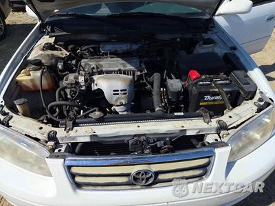 Zdjęcie 11 z 13 samochodu: 2000 TOYOTA CAMRY LE VIN:4T1BG22K8YU977692 - miniatura