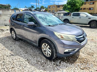 Czwarte zdjęcie samochodu z boku: 2016 HONDA CR-V EXL VIN:2HKRM3H76GH564523 - miniatura