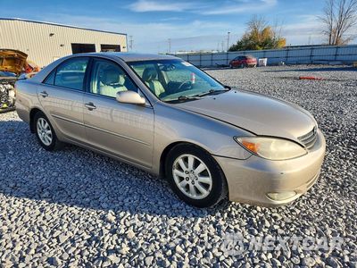 Czwarte zdjęcie samochodu z boku: 2004 TOYOTA CAMRY XLE V6 VIN:4T1BF30K84U081804 - miniatura