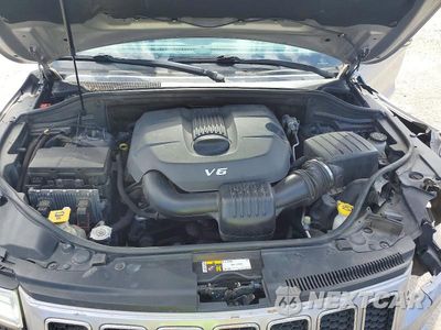 Zdjęcie 12 z 13 samochodu: 2015 JEEP GRAND CHEROKEE OVERLAND VIN:1C4RJFCGXFC726942 - miniatura