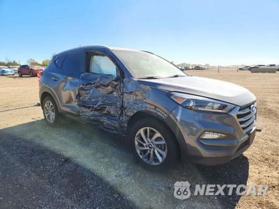 Czwarte zdjęcie samochodu z boku: 2017 HYUNDAI TUCSON SE VIN:KM8J3CA42HU475227 - miniatura