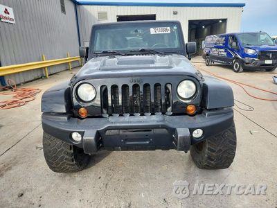 Piąte zdjęcie samochodu w środku: 2013 JEEP WRANGLER UNLIMITED SAHARA VIN:1C4HJWEG5DL580603 - miniatura
