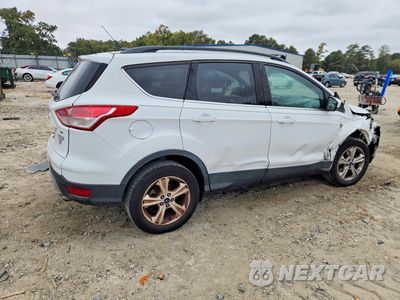 Trzecie zdjęcie samochodu z tyłu: 2016 FORD ESCAPE SE VIN:1FMCU0G95GUC21033 - miniatura