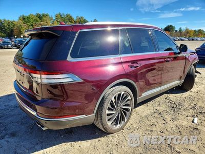 Trzecie zdjęcie samochodu z tyłu: 2020 LINCOLN AVIATOR RESERVE VIN:5LM5J7XC1LGL20198 - miniatura