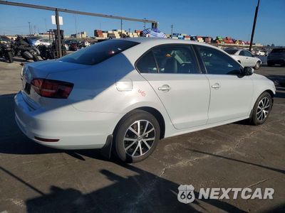 Trzecie zdjęcie samochodu z tyłu: 2017 VOLKSWAGEN JETTA SE VIN:3VWDB7AJ7HM355183 - miniatura