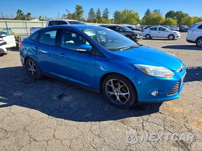 Czwarte zdjęcie samochodu z boku: 2014 FORD FOCUS SE VIN:1FADP3F22EL309004 - miniatura