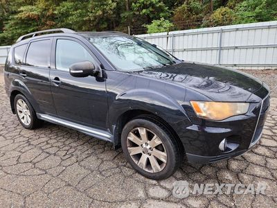 Czwarte zdjęcie samochodu z boku: 2011 MITSUBISHI OUTLANDER SE VIN:JA4JT3AW4BU032634 - miniatura