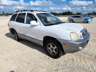 Czwarte zdjęcie samochodu z boku: 2004 HYUNDAI SANTA FE GLS VIN:KM8SC13D84U791540 - miniatura