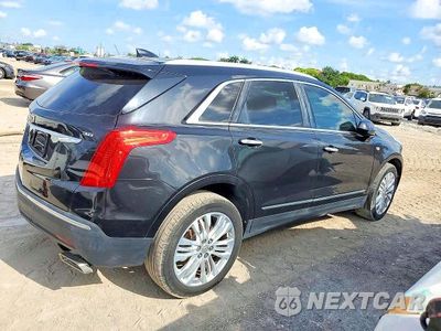 Trzecie zdjęcie samochodu z tyłu: 2017 CADILLAC XT5 PREMIUM LUXURY VIN:1GYKNCRS8HZ112031 - miniatura