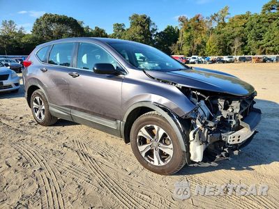 Czwarte zdjęcie samochodu z boku: 2017 HONDA CR-V LX VIN:2HKRW6H39HH213227 - miniatura