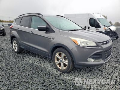 Czwarte zdjęcie samochodu z boku: 2014 FORD ESCAPE SE VIN:1FMCU9G92EUA90869 - miniatura