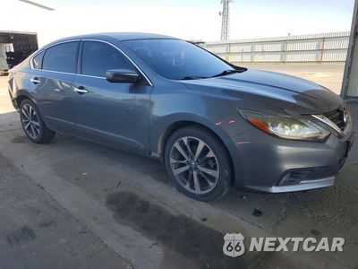 Czwarte zdjęcie samochodu z boku: 2016 NISSAN ALTIMA 2.5 SR VIN:1N4AL3AP2GC273383 - miniatura