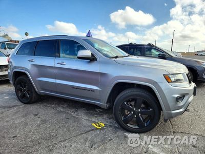 Czwarte zdjęcie samochodu z boku: 2015 JEEP GRAND CHEROKEE LAREDO VIN:1C4RJFAG7FC141786 - miniatura