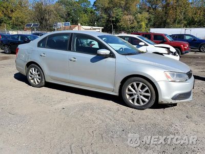 Czwarte zdjęcie samochodu z boku: 2011 VOLKSWAGEN JETTA SE VIN:3VWBZ7AJ5BM340501 - miniatura