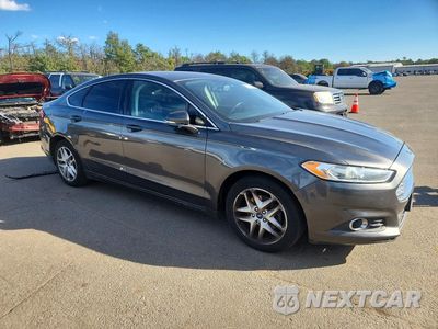 Czwarte zdjęcie samochodu z boku: 2016 FORD FUSION SE VIN:3FA6P0HD4GR272354 - miniatura