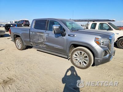 Czwarte zdjęcie samochodu z boku: 2020 GMC SIERRA K1500 DENALI VIN:3GTU9FET7LG358029 - miniatura