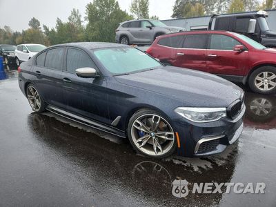 Czwarte zdjęcie samochodu z boku: 2019 BMW M550XI VIN:WBAJB9C56KB288959 - miniatura