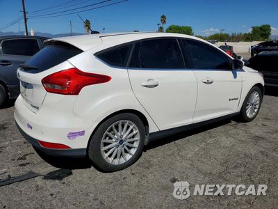 Trzecie zdjęcie samochodu z tyłu: 2017 FORD FOCUS BEV VIN:1FADP3R4XHL325341 - miniatura
